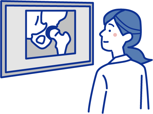 検査の画像を確認する医者