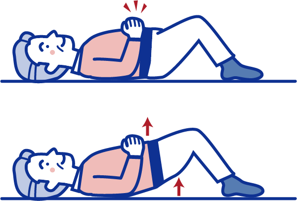 仰向けに寝て両ひざを立てる男性